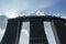 Marina Bay Sands on blue sky background with some clouds and sun rays, SINGAPORE