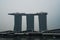 Marina Bay Sands over cloudy sky background