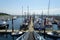 A marina with docks full of all types of boats on a beautiful sunny day in Comox, British Columbia, Canada