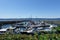 A marina with docks full of boats on a beautiful sunny day in Powell River, British Columbia, Canada