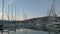 Marina with many boats on a quiet evening. sailboats and motor yachts are moored side by side