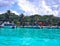 Marina in the Rashdoo island, Maldives. Blue skay, white clouds and turquoise water