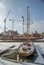 Marina with sailboats in Old Town of Gdansk Poland. Granary island with construction works in the background.