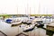 Marina with small boats anchored in Malmo in Sweden on a cloudy day