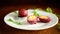 Marinated chicken eggs in beetroot marinade in a plate