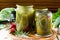 Marinated cucumbers gherkins. Marinated pickles with rosemary and chili