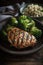Marinated grilled healthy chicken breasts with broccoli, cooked on a summer BBQ