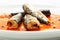 Marinated mackerel in tomato souce