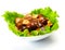 Marinated mushrooms with lettuce leaves.