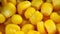 Marinated sweet yellow corn seeds in metal can container close up