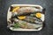 Marinated trout fish with salt, lemon and spices, Healthy food or diet nutrition concept. banner, menu, recipe place for text, top