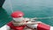 Marine bollard and old rope on pier used and footpath color red and white no parking in the area in this area