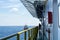 A marine captain monitoring an anchor handling tug boat maneuvering at offshore oil field