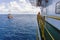 A marine captain monitoring an anchor handling tug boat maneuvering at offshore oil field