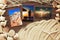 Marine items on a wooden boards against sandy background