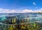 Marine landscape with transparent water and sky. Transparent seawater with coral reef under water.