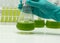 Marine plankton or Microalgae culture into a test tube in laboratory