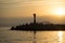 Marine sunset with a view of the navigation light