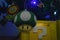 Mario mushroom cartoon,colorful flower and yellow box with a big white question mark like ornaments on a Christmas tree.