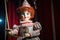 a marionette doll resembling a knight with sword and shield