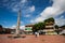 MARIQUITA, COLOMBIA - MAY, 2022: Obelisk at the Jose Celestino Mutis square and the Town Hall building of Mariquita in Colombia