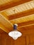 Maritime hanging lamp at a wooden ceiling
