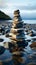 Maritime monument Sea coast stones form a pyramid, echoing ancient traditions by waves