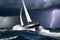 Maritime Resilience: Sailboat Battling Fierce Waves During a Storm in the Middle of the Ocean - Dark Ominous Clouds Sweeping the