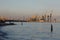 MARIUPOL, UKRAINE - SEPTEMBER 5, 2016: Many big cranes silhouette in the port at golden light of sunset