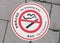 Mark of smoking prohibited area stuck on the ground of Japan