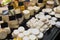 Market counter with fresh cheese kinds