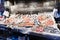 Market counter in Mediterranean. Fresh fish and various shrimp in crushed ice