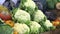 Market place for sale of fresh cauliflower, red and green cabbage, and pumpkins, high quality natural vegetables