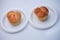 Market snack bread filled with jam on a white background