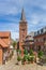 Market square and church tower in Plon