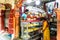 A market stall showing Hindu devotional Puja items or religious offerings, sweet food flowers at Dakshineswar Kali temple Street