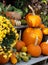 Market stand with fall decoration of pumpkins, gourds, mums