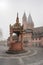 Marktbrunnen Fountain at Market Square Marktplatz in front of Mainz Cathedral on a foggy day - Mainz, Germany