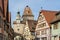 Markus Tower Markusturm and traditional German houses on the Rodergasse street, Rothenburg ob der Tauber,