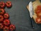 Marmande tomatoes with knife and cutting board