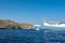 Marmari Express big blue ferry ship enterning port in Coressia on Kea Island, Cyclades, Greece in the morning on sunny day.