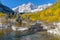 Maroon Bells and Creek in Autumn Snow