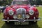 Maroon classic Jaguar saloon car