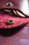 Maroon leather wallet opened coin pocket closeup - Image