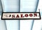 Maroon and Off White Saloon Sign