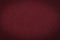 Maroon paper background or texture