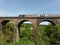 Marple viaduct stand on the vally and train are passing