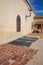 Marrakech, Morocco - Feb 10, 2023: Tanned leather pieces drying in the sun on a street in the Medina of Marrakech