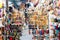 Marrakech, Morocco, september 16, 2019: Shoes hanging in an oriental market with people walking through