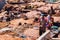 MARRAKESH, MOROCCO - JUNE 04, 2017: Unknown wokers on the old tannery in Marrakech on a sunny day